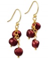 Go for a subtle hint of color. These beautiful earrings feature cranberry-colored cultured freshwater pearls (6-7 mm) set in 18k gold over sterling silver. Approximate drop: 1-1/4 inches.