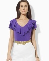 A chic V-neck jersey top is trimmed with a flourish of ruffles at the neckline and delicate flutter sleeves.