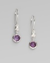 From the Silver Rain Collection. A pretty design with a faceted dark amethyst accented with sparking diamonds. Diamonds, .07 tcwDark amethystSterling silverDrop, about 1Hook backImported 
