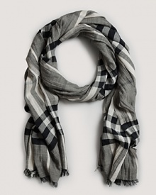 Soft, shadowy shades in a classic Burberry check keep you warm and stylish. Soft, shadowy shades in a classic Burberry check keep you warm and stylish.