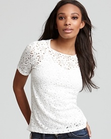A delicate lace front contrasts a knit back on this Generation Love top, a romantic topper to your favorite jeans. A delicate lace front contrasts a knit back on this Generation Love top, a romantic topper to your favorite jeans.
