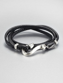 From the Dayak Collection. A strand of rich black leather wraps around the wrist, then closes with a bold sterling silver hook for a look of street-smart elegance.LeatherSterling silverStrap width, about .5Diameter, about 2.5Hook-and-loop closureMade in Bali From the Dayak Collection. A strand of rich black leather wraps around the wrist, then closes with a bold sterling silver hook for a look of street-smart elegance.LeatherSterling silverStrap width, about .5Diameter, about 2.5Hook-and-loop closureMade in Bali