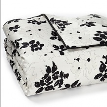 Summer floral receive a chic update in a palette of crisp black, white and cream - mixed with timeless dots and stripes, this graphic collection lends modern freshness to any home. Summer floral receive a chic update in a palette of crisp black, white and cream - mixed with timeless dots and stripes, this graphic collection lends modern freshness to any home.