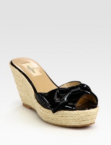 Pretty in patent leather with bow detail at the open toe.Rope-covered heel, 3½ (90mm) Rope-covered platform, 1½ (40mm) Compares to a 2 heel (50mm) Leather lining Padded insole Rubber sole Made in ItalyOUR FIT MODEL RECOMMENDS ordering one half size up as this style runs small. Pretty in patent leather with bow detail at the open toe.Rope-covered heel, 3½ (90mm) Rope-covered platform, 1½ (40mm) Compares to a 2 heel (50mm) Leather lining Padded insole Rubber sole Made in ItalyOUR FIT MODEL RECOMMENDS ordering one half size up as this style runs small.