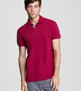 Burberry's check print lines the placket of this sharp slim-fit polo.