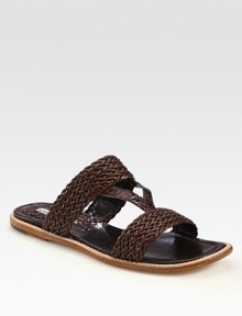 Artfully woven leather with wrap-around straps and a slip-on silhouette. Woven leather upperLeather liningBuffed leather solePadded insoleMade in ItalyOUR FIT MODEL RECOMMENDS ordering one half size up as this style runs small. Artfully woven leather with wrap-around straps and a slip-on silhouette. Woven leather upperLeather liningBuffed leather solePadded insoleMade in ItalyOUR FIT MODEL RECOMMENDS ordering one half size up as this style runs small.