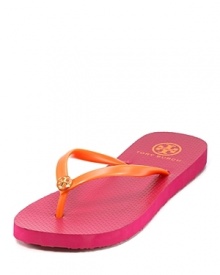 Bright, bold hues give the classic flip flop a tropical twist, Tory Burch-style.