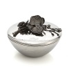 The Black Orchid Collection takes its inspiration from the intricacies of form and texture found in foliage from around the world. By interpreting plant forms in cast metal, Aram presents work which is evocative of a natural environment transformed and redefined.