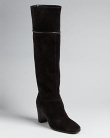 The Delman approach to luxury; high style in a streamlined boot designed to stand the test of time. The Delman approach to luxury; high style in a streamlined boot designed to stand the test of time.