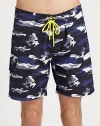 Classic, camo print adorns these swim trunks shaped in quick-drying nylon, with a drawstring waist for an easy-fit.Drawstring tie waistSide cargo pocketInseam, about 9NylonMachine washImported