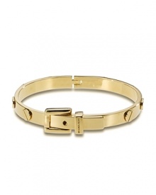 A step beyond basic, MICHAEL Michael Kors' buckle-trimmed bangle makes a subtle statement. Style yours with a clean white blouse--roll up the sleeves to make this piece pop. A step beyond basic, MICHAEL Michael Kors' buckle-trimmed bangle makes a subtle statement. Style yours with a clean white blouse--roll up the sleeves to make this piece pop.