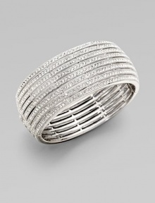 Sparkle brighter with this rhodium plated piece. Brass Crystals Box and tongue closure Diameter, about 2¼ Width, about 1 Imported Sparkle brighter with this rhodium plated piece. Brass Crystals Box and tongue closure Diameter, about 2¼ Width, about 1 Imported