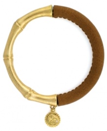One part Zen and one part colorblock equals two parts fabulous! Jessica Simpson's totally-chic bangle features a serene bamboo setting in gold tone mixed metal combined with stretchable brown polyurethane. Approximate length (when stretched): 10 inches. One part Zen and one part colorblock equals two parts fabulous! Jessica Simpson's totally-chic bangle features a serene bamboo setting in gold tone mixed metal combined with stretchable brown polyurethane. Approximate length (when stretched): 10 inches.