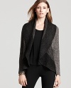 The relaxed, open styling of this Eileen Fisher wool cardigan lends itself to layering, topping your closet favorites with luxe lightweight warmth.