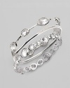 From the Paparazzi Collection. Ovals of faceted clear quartz shimmer within a bangle of polished sterling silver. Clear quartz Sterling silver Diameter, about 2¾ Imported Please note: Bracelets sold separately.