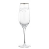 Delicately-etched leaves dance across these elegant crystal flutes lending timeless allure to celebrations and fine dining occasions.