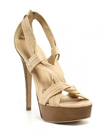 These teetering Burberry platforms offer leg-lengthening appeal, from a neutral, skin-tone hue to a towering heel. These teetering Burberry platforms offer leg-lengthening appeal, from a neutral, skin-tone hue to a towering heel.