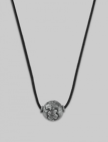 A sleek leather cord holds a sphere of hand-forged sterling silver with a rustic cross design.Leather Sterling silver Length, about 21 Hematite bead clasp Made in USA A sleek leather cord holds a sphere of hand-forged sterling silver with a rustic cross design.Leather Sterling silver Length, about 21 Hematite bead clasp Made in USA
