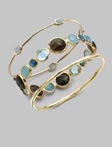 From the Rock Candy® Collection. Five, pretty, milky aquamarine cabochon stations on a delicate 18k gold bangle. Milky aquamarine18K goldSlip-on styleDiameter, about 2½Imported 