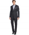 Designing with admirable understatement, DKNY tailors a slim-fit suit  with a longer, leaner line.