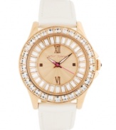 A new neutral for when you want to kick things into gear, by Betsey Johnson. Watch crafted of beige leather strap and round rose-gold tone stainless steel case. Bezel embellished with crystal accents. Textured rose-gold tone dial features ring of baguette-cut crystal accents, applied rose-gold tone Roman numerals at twelve and six o'clock, dot markers at three and nine o'clock, luminous hour and minute hands, signature fuchsia second hand and logo at twelve o'clock. Quartz movement. Water resistant to 30 meters. Two-year limited warranty.