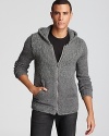This zip hoodie sweater is full of personality and exudes casual cool style, constructed with offsetting knit panels for a stylish contrast. Wear with skinny jeans and high-tops for a top-notch downtown look.