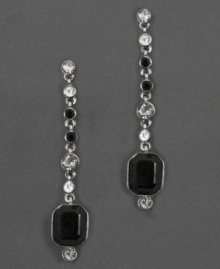 Play up the classic contrast of black and white with these dramatic and sophisticated drop earrings. With octagonal cut jet crystals and round-cut faceted clear and jet crystals hanging along a silverplate chain. Each measures 1.7 inches long. Play up the classic contrast of black and white with these dramatic and sophisticated drop earrings. With octagonal cut jet crystals and round-cut faceted clear and jet crystals hanging along a silverplate chain. Each measures 1.7 inches long.