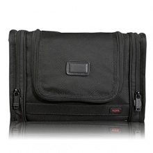Crafted from Tumi's signature ballistic nylon, this versatile travel kit offers great organization for your toiletries when you're on the road. It hangs from virtually any fixture or can sit on the counter. Features numerous interior and two exterior pockets. Crafted from Tumi's signature ballistic nylon, this versatile travel kit offers great organization for your toiletries when you're on the road. It hangs from virtually any fixture or can sit on the counter. Features numerous interior and two exterior pockets.