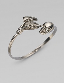 Sparkling Swarovski crystals add a bit of dazzle to this edgy skull and claw design. Swarovski crystalsBrassDiameter, about 2½Slip-on styleMade in Italy Sparkling Swarovski crystals add a bit of dazzle to this edgy skull and claw design. Swarovski crystalsBrassDiameter, about 2½Slip-on styleMade in Italy