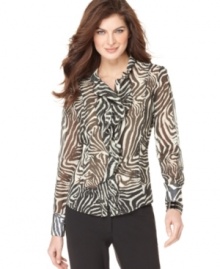 Walk on the wild side in this Jones New York blouse, featuring a chic animal print on semi-sheer fabric. Pair it with a cami and slim pants for desk-to-dinner style! Walk on the wild side in this Jones New York blouse, featuring a chic animal print on semi-sheer fabric. Pair it with a cami and slim pants for desk-to-dinner style!
