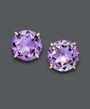 A royal affair. Earrings feature round-cut amethyst (6-1/3 ct. t.w.) set in 14k gold. Approximate diameter: 1/2 inch.