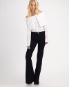 Popular mid-rise flare-leg style that accentuates the hips and gives the appearance of an elongated leg.THE FITFitted through hips and thighs Flared leg Rise, about 9½ Inseam, about 36THE DETAILSZip fly Jet front pockets Back patch pockets 72% cotton/28% elastene; machine wash Imported 