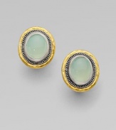 From the Gauntlet Collection. Smooth oval buttons of pastel aqua chalcedony, elegantly framed in granulated sterling silver and hammered 24k gold.Aqua chalcedonySterling silver and 24k yellow goldLength, about ¾Post-and-hinge backImported