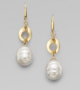 This unique and chic design with a baroque pearl and a three dimensional 18k gold oval link is simply stunning.12mm baroque white organic man-made pearls18k goldplated sterling silverDrop, about 2Lever hook backImported 
