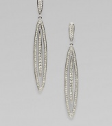EXCLUSIVELY AT SAKS. A stunning style featuring an elongated oval accented with brilliant pavé crystals. CrystalsRhodium-plated brassDrop, about 2½Post backImported 