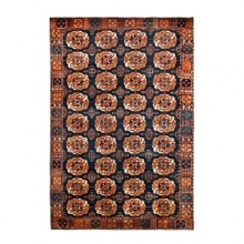 A lavish way to warm any room, this Bokhara Ralph Lauren rug boasts an 18th century medallion design woven in deep spiced hues.Available in two opulent colorways. A lavish way to warm any room, this Bokhara Ralph Lauren rug boasts an 18th century medallion design woven in deep spiced hues.Available in two opulent colorways.