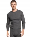 Layer up with the warm waffle-knit feel of this stretch cotton long-sleeved thermal from Alfani.