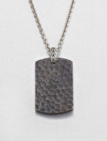 From the Palu Collection. The hand-hammered design motif of the Palu collection distinguishes a blackened bronze dog tag pendant, connected by a sterling silver bale to a bold chain of bright stainless steel.Bronze and sterling silverStainless steelChain length, about 24Pendant, about 2L X 1WLobster claspMade in Bali From the Palu Collection. The hand-hammered design motif of the Palu collection distinguishes a blackened bronze dog tag pendant, connected by a sterling silver bale to a bold chain of bright stainless steel.Bronze and sterling silverStainless steelChain length, about 24Pendant, about 2L X 1WLobster claspMade in Bali