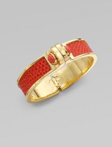 This chic style boasts boldly colored, glitter lizard skin inlay with pretty, coral stone accents set in 14k goldplating. Glitter lizard skinReconstituted coral14k goldplated white metal alloyDiameter, about 2¼Hinged closureMade in USA This chic style boasts boldly colored, glitter lizard skin inlay with pretty, coral stone accents set in 14k goldplating. Glitter lizard skinReconstituted coral14k goldplated white metal alloyDiameter, about 2¼Hinged closureMade in USA