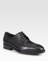 Classic captoe lace-up expertly crafted in Italy from smooth calfskin leather with perforated detail and a comfortable rubber sole.Leather upperLeather liningPadded insoleRubber soleMade in Italy