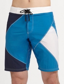 Sport-inspired swim favorite styled in a classic fit set in quick-dry nylon.Drawstring waistBack zip pocketInseam, about 10PolyamideMachine washImported Sport-inspired swim favorite styled in a classic fit set in quick-dry nylon.Drawstring waistBack zip pocketInseam, about 10PolyamideMachine washImported