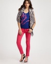 Boldly colored denim in a flattering and chic skinny fit.THE FITFitted through hips, thighs and calvesSkinny legRise, about 8Inseam, about 27THE DETAILSZip flyFive-pocket style98% cotton/2% spandex; dry cleanMade in ItalyModel shown is 5'10 (177cm) wearing US size 4.