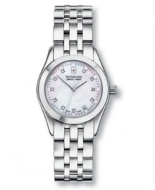 A sophisticated style, perfect for every day. Stainless steel bracelet and case. Mother-of-pearl dial with logo at 12 o'clock, date window at 6 o'clock and sparkling diamond accent indexes. Three hands. Anti-reflecting sapphire crystal. Low battery indicator. Swiss made. Analog quartz movement. Water resistant to 100 meters. Three-year limited warranty. A sophisticated style, perfect for every day. Stainless steel bracelet and case. Mother-of-pearl dial with logo at 12 o'clock, date window at 6 o'clock and sparkling diamond accent indexes. Three hands. Anti-reflecting sapphire crystal. Low battery indicator. Swiss made. Analog quartz movement. Water resistant to 100 meters. Three-year limited warranty.