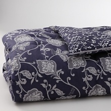 A rich tapestry of a woven floral pattern in soft cotton, this comforter has a beautiful pattern on both sides. Textured jacquard lays easy on indigo. A rich tapestry of a woven floral pattern in soft cotton, this comforter has a beautiful pattern on both sides. Textured jacquard lays easy on indigo.