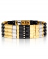 Embrace your daring side. This bold stretch bracelet from Nine West is crafted from gold-tone, silver-tone and hematite-tone mixed metal with glass crystal stones only adding to the stunning look. Approximate diameter: 2-1/4 inches.