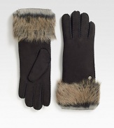 A soft, dyed shearling cuff and supple suede upper help make this glamorous style a cold weather essential.Length, about 12.5Professional leather dry cleanerImportedFur origin: Spain