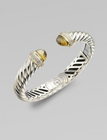 From the Waverly Collection. A signature Yurman cable of sterling silver, with faceted olive quartz end caps, accents of 18k gold and bands of pavé diamonds.Diamonds, 0.40 tcw Olive quartz Sterling silver and 18k yellow gold Cable, 5mm Diameter, about 2¼ Hinged Imported From the Waverly Collection. A signature Yurman cable of sterling silver, with faceted olive quartz end caps, accents of 18k gold and bands of pavé diamonds.Diamonds, 0.40 tcw Olive quartz Sterling silver and 18k yellow gold Cable, 5mm Diameter, about 2¼ Hinged Imported
