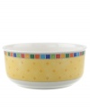 Serve fresh vegetables in the Twist Alea round vegetable bowl. The bright enamel colorblock design is a perfect contrast to the fine white china. Features a vivid band of color along the rim.