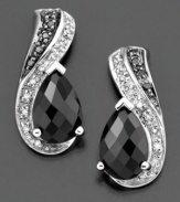 Add a touch of fabulous to your look with these stylish earrings featuring onyx (9 by 6 mm) and round-cut diamonds (1/10 ct. t.w.) set in sterling silver. Approximate drop: 3/4 inches.