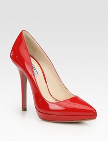 Patent leather style with a pointed toe and platform. Self-covered heel, 4½ (115mm)Covered platform, ½ (15mm)Compares to a 4 heel (100mm)Patent leather upperLeather lining and solePadded insoleMade in ItalyOUR FIT MODEL RECOMMENDS ordering one half size up as this style runs small. Patent leather style with a pointed toe and platform. Self-covered heel, 4½ (115mm)Covered platform, ½ (15mm)Compares to a 4 heel (100mm)Patent leather upperLeather lining and solePadded insoleMade in ItalyOUR FIT MODEL RECOMMENDS ordering one half size up as this style runs small.